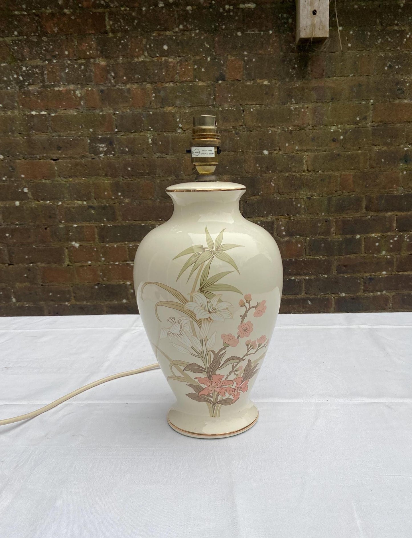 vintage marks and spencer St Michaels ceramic vintage table lamp. Cream with pink and green floral and leaf details. working vintage 1980s table lamp