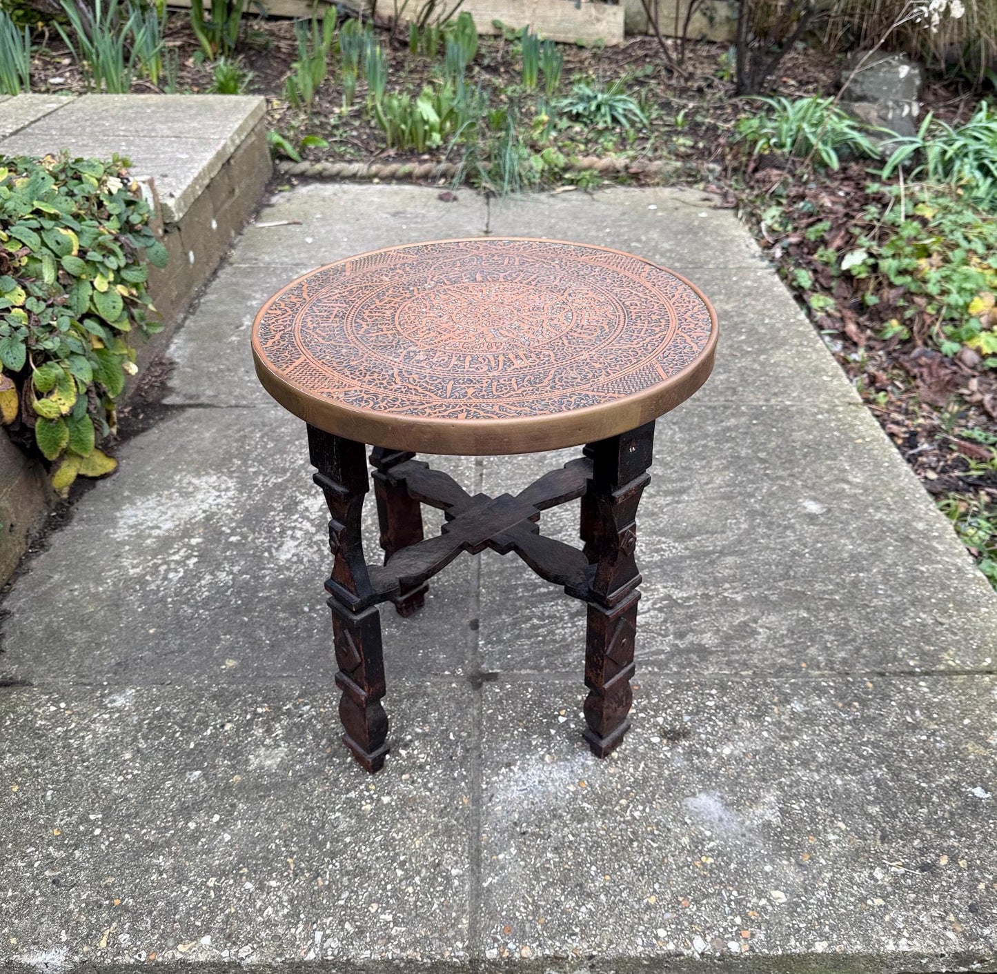 lovely early to mid century Benares coffee table or plant stand. Wooden carved base with brass engraved top. An early example of these very popular tables. VGC