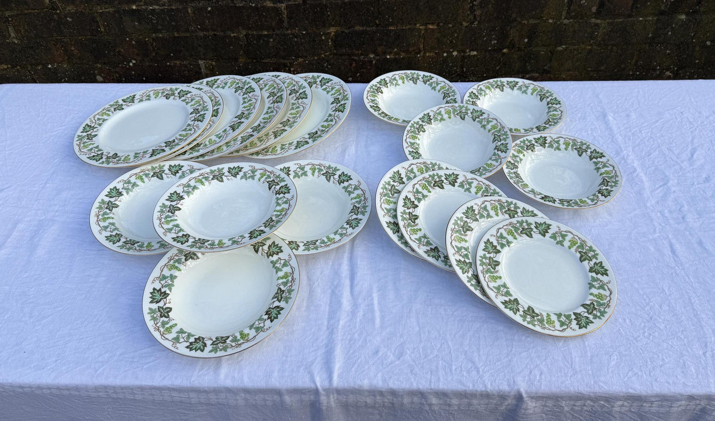 1950s / 1960s Santa Clara part dinner service by Wedgwood. Wonderful white china with ivy motif around the edges. Excellent condition. 18 pieces. incl dinner plates, side plates, dessert bowls, soup bowls