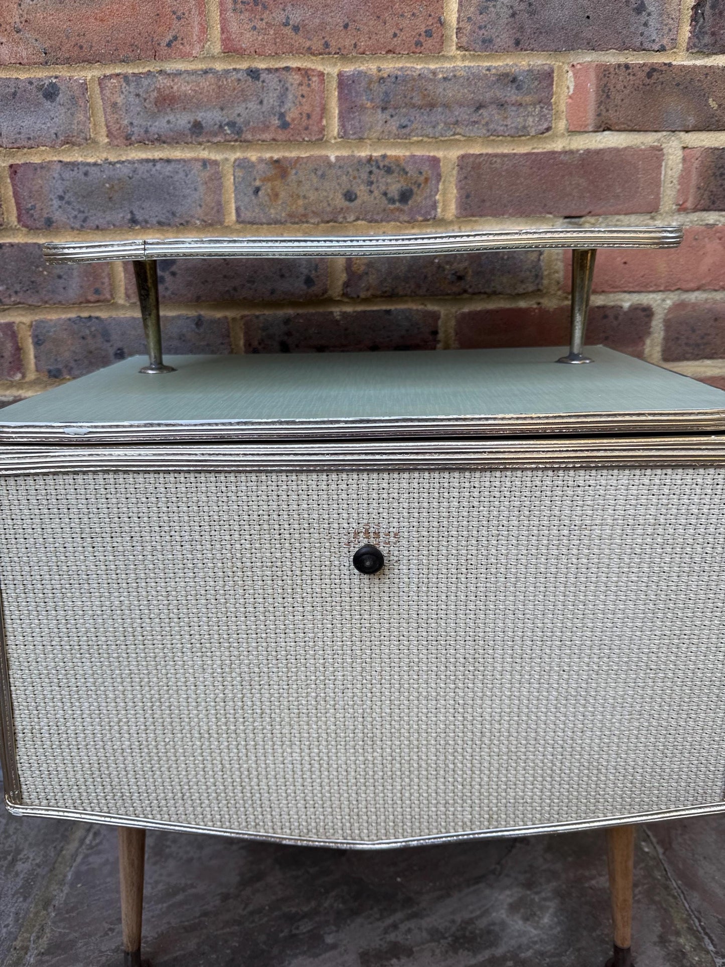 Rare mid-century bedside cupboard, super retro style with woven detail, chrome effect and tapered legs