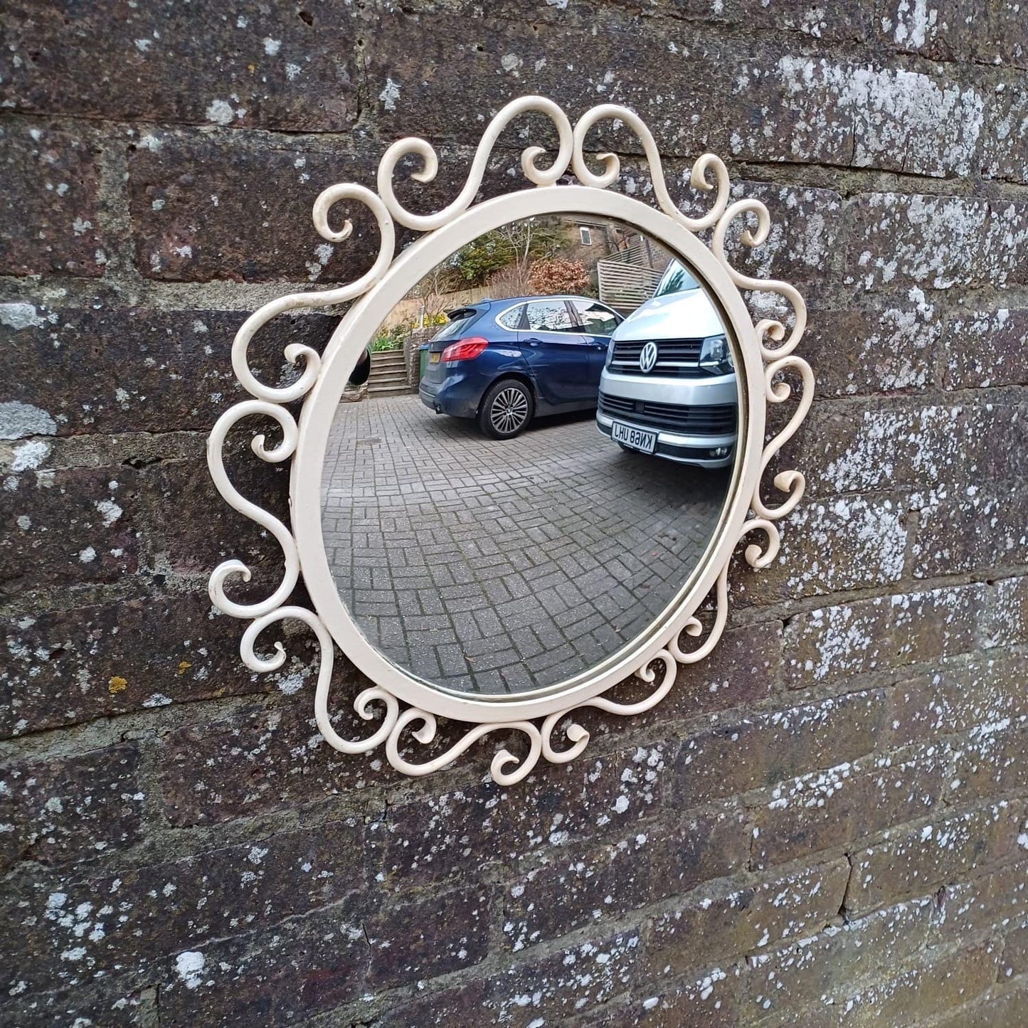Vintage scrollwork round mirror with chain hanger and original wooden back - mid-century, French provincial revival - small wall mirror