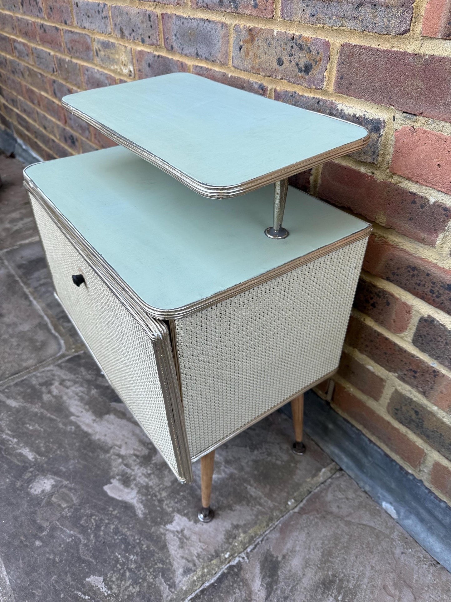 Rare mid-century bedside cupboard, super retro style with woven detail, chrome effect and tapered legs
