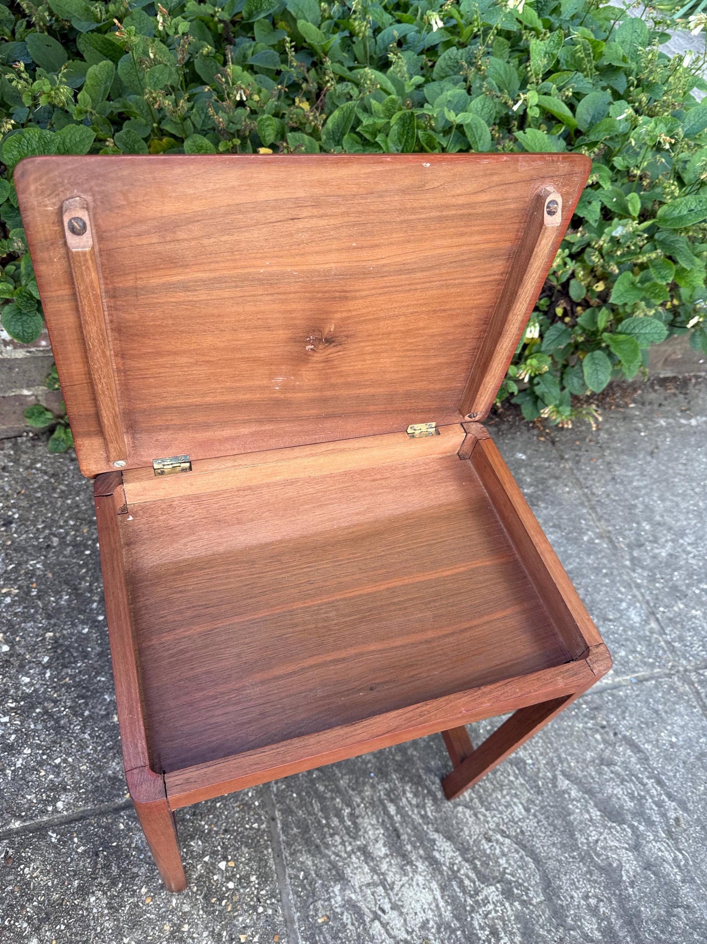 Delightful hand carved vintage 1950s occasional table with secret storage compartment; small side table, plant stand, mid century table