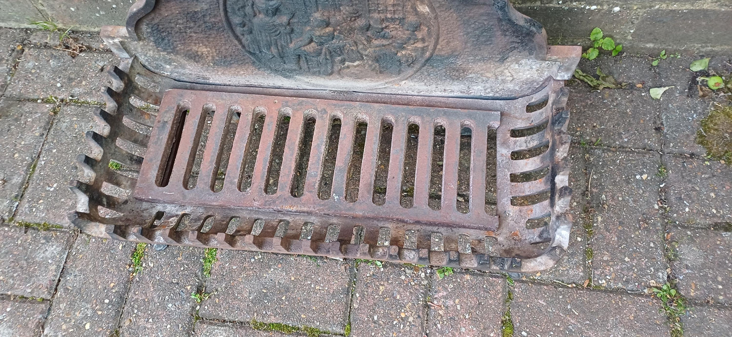 Antique Cast Iron Fire Grate with Decorative Relief Panel – Ornate 19th Century Style Fireplace Basket with Claw Feet