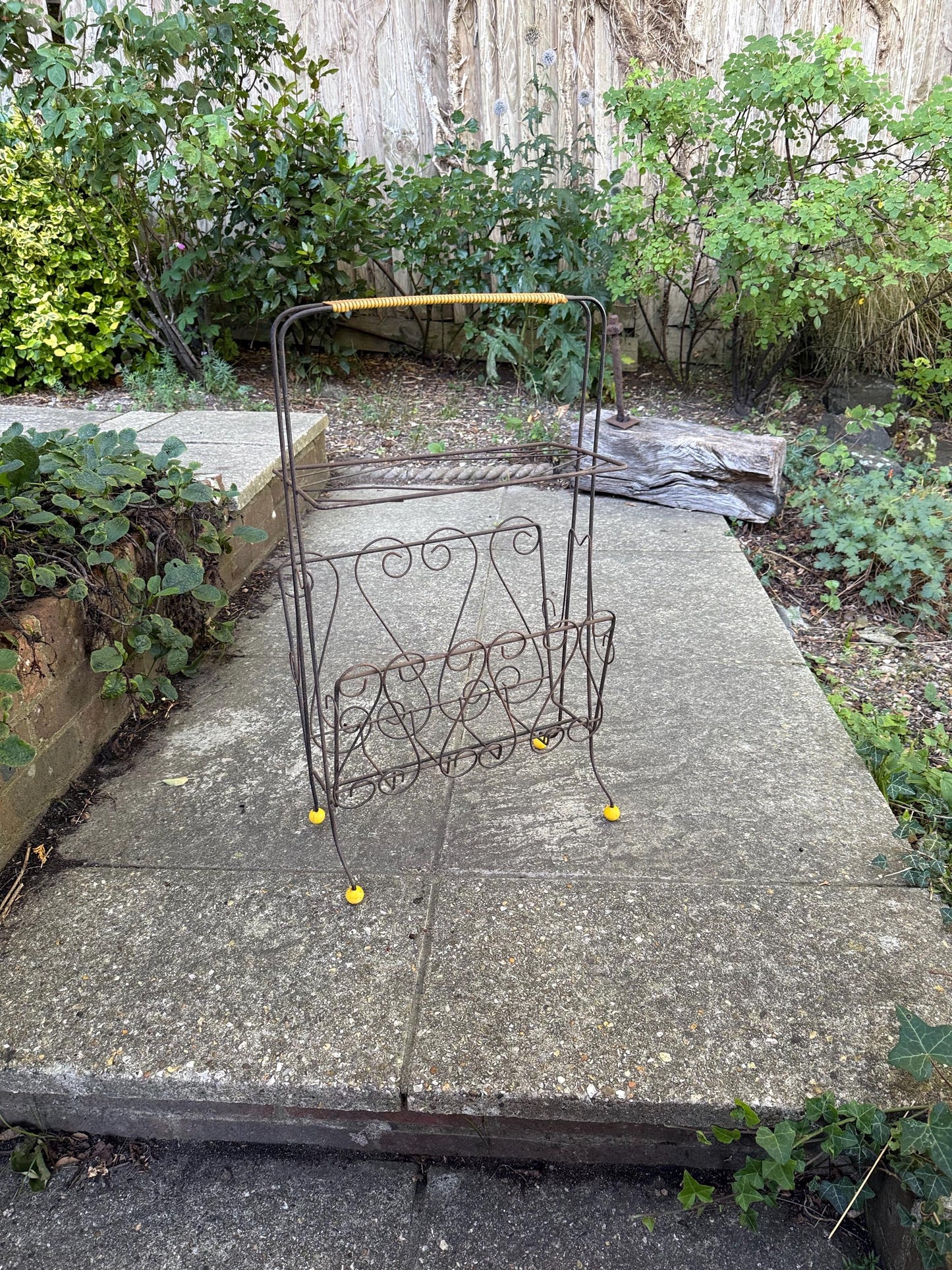 Vintage 1950s Wire Magazine Rack – Mid-Century Scrollwork Storage Stand with original Yellow Feet & Handle, vintage storage rack - towels?