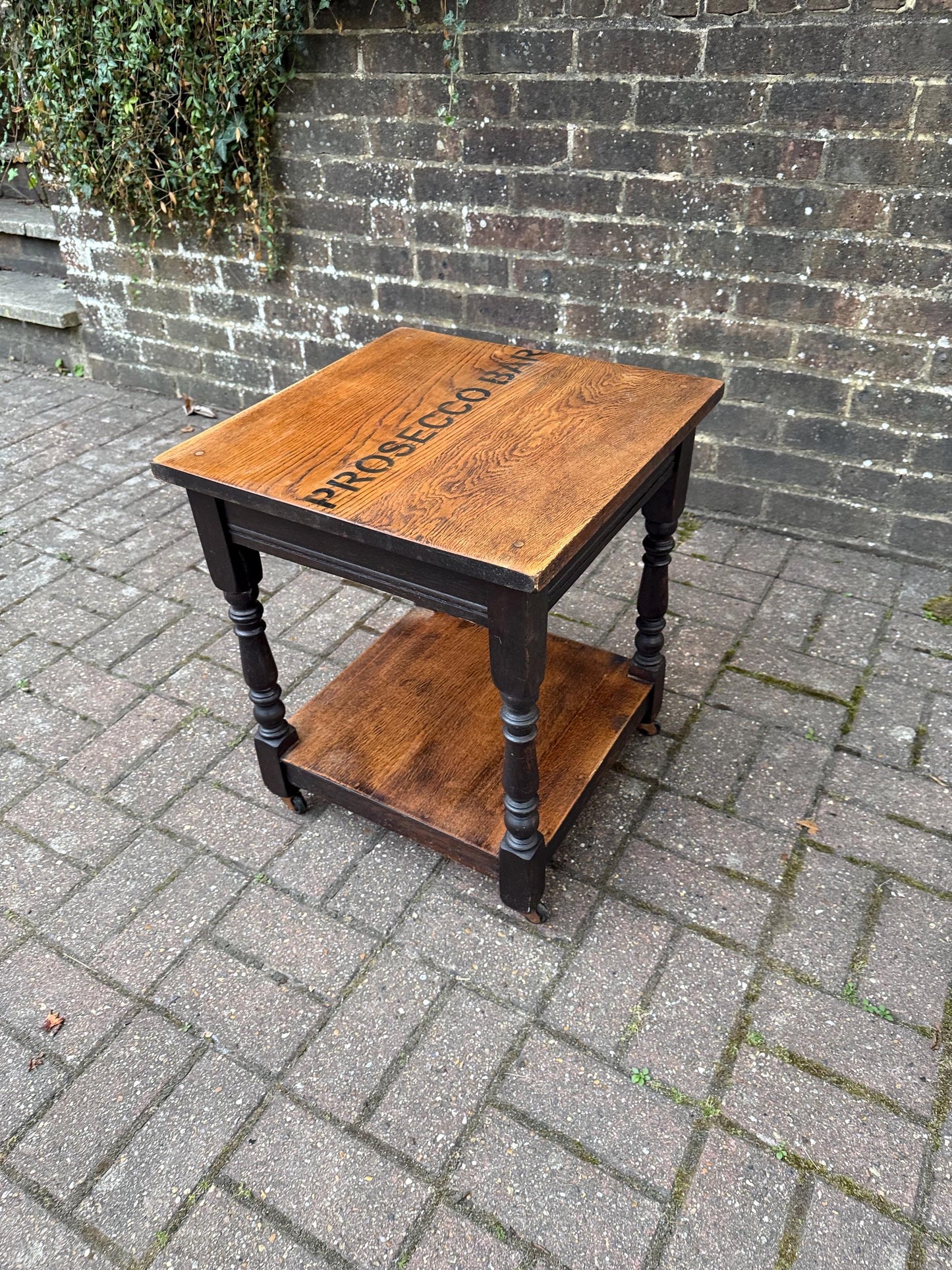 Vintage upcycled solid oak trolley / side table. Sanded and oiled top and shelf. Wheels. Prosecco Bar label. Cocktail table, Bar furniture