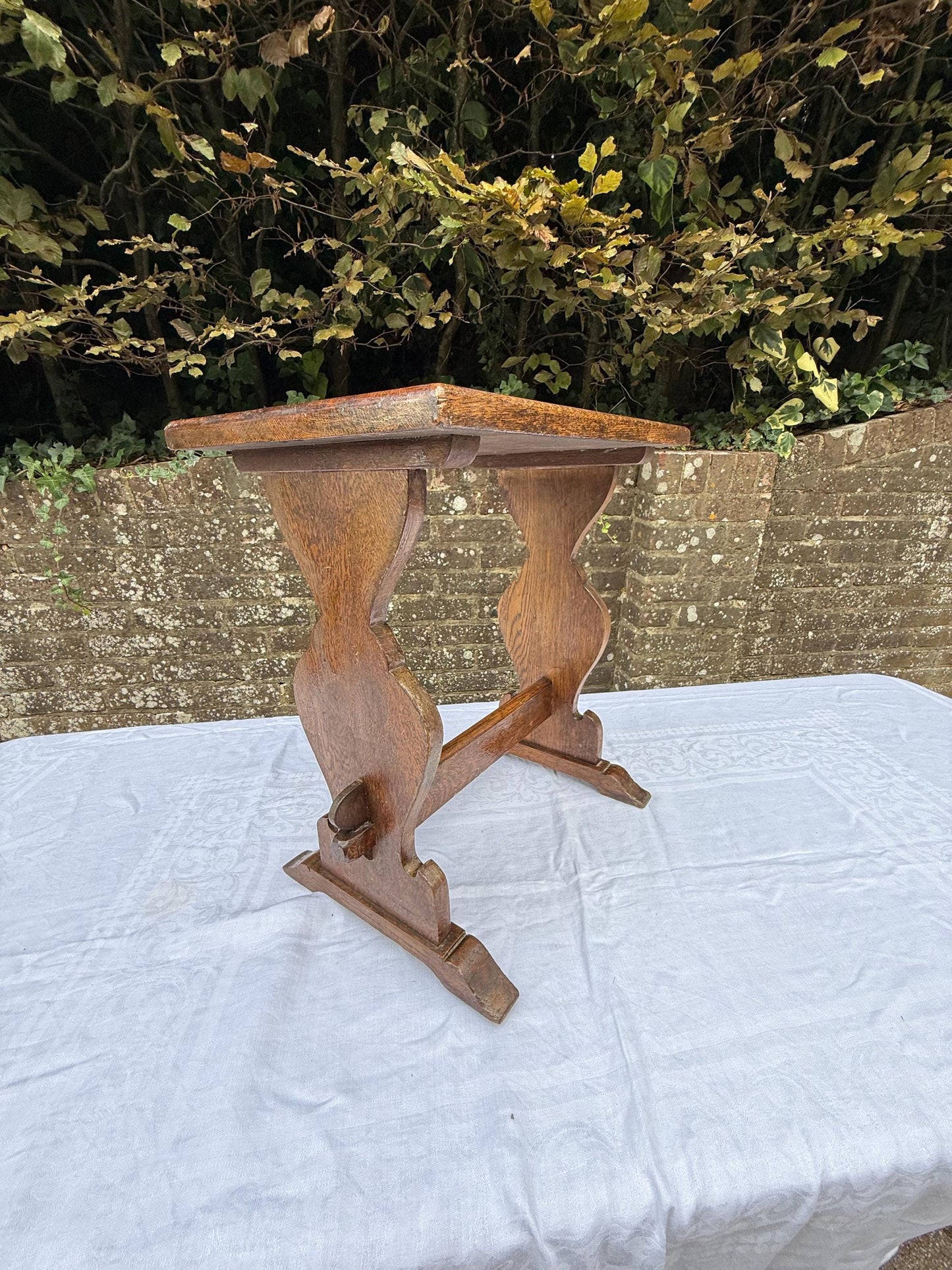 Antique Arts & Crafts Oak Side Table, Early 20th Century English Rustic Occasional Table with Carved Trestle Base
