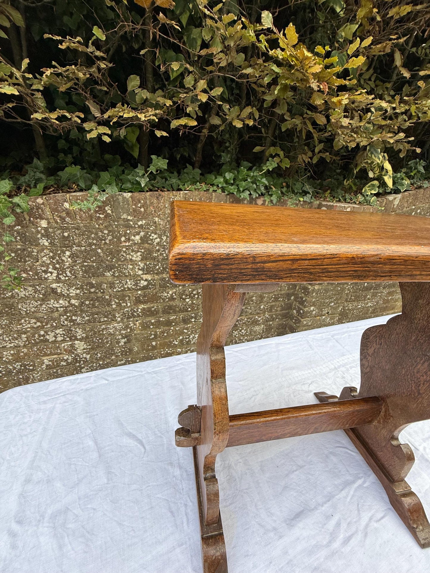 Antique Arts & Crafts Oak Side Table, Early 20th Century English Rustic Occasional Table with Carved Trestle Base