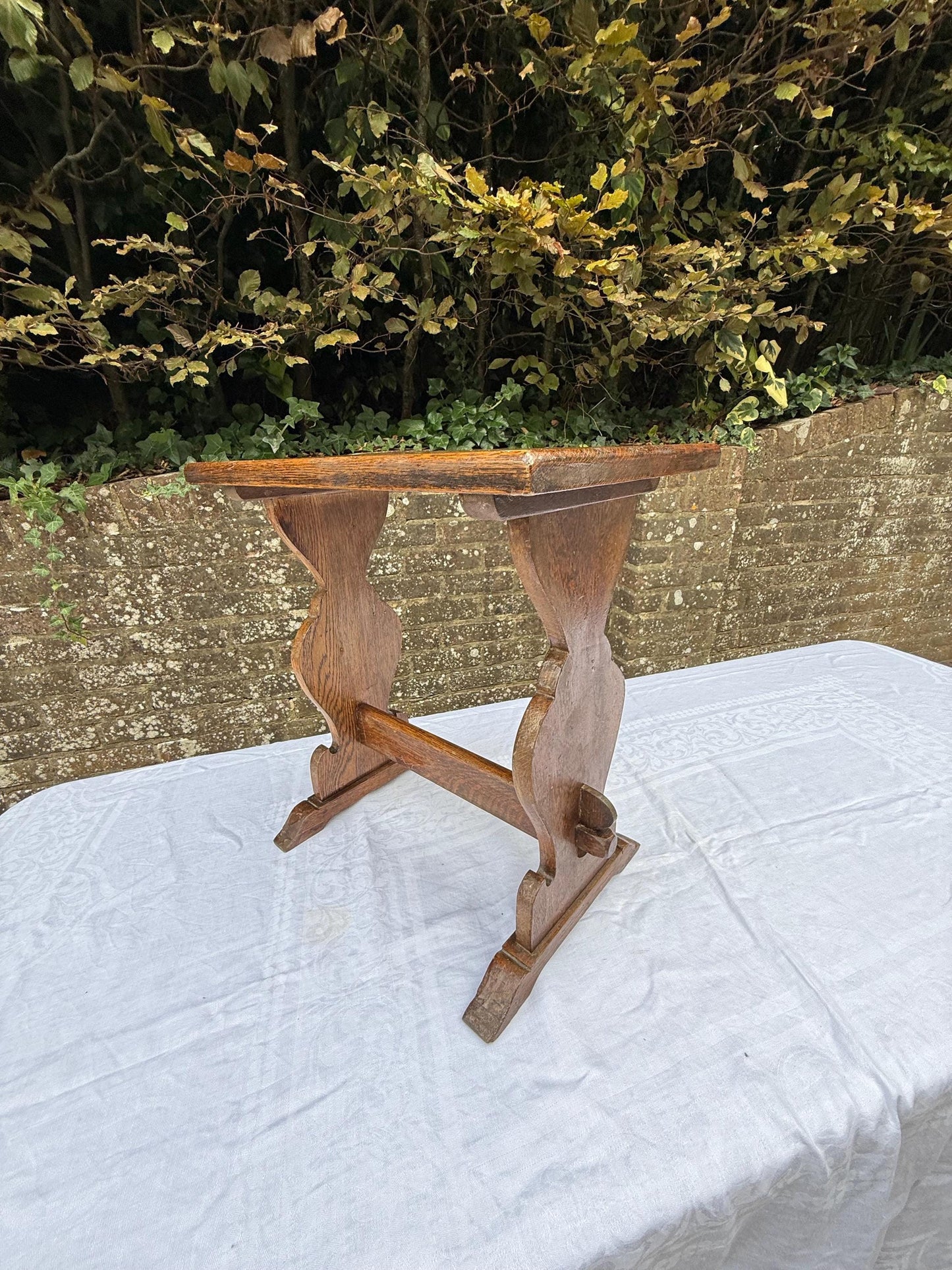 Antique Arts & Crafts Oak Side Table, Early 20th Century English Rustic Occasional Table with Carved Trestle Base