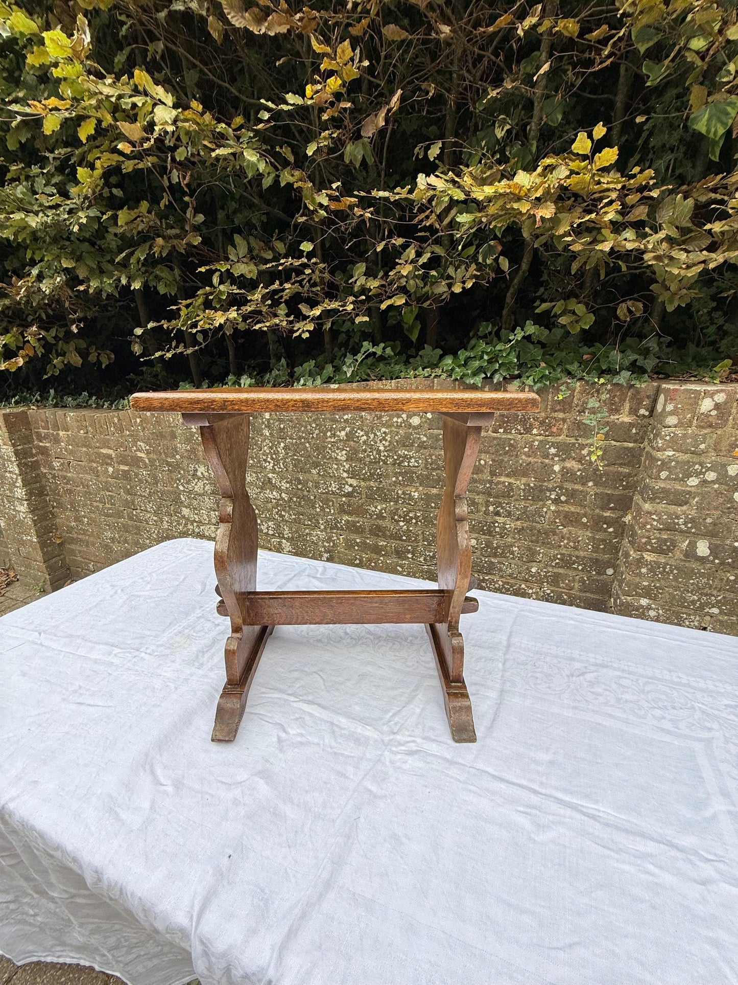 Antique Arts & Crafts Oak Side Table, Early 20th Century English Rustic Occasional Table with Carved Trestle Base