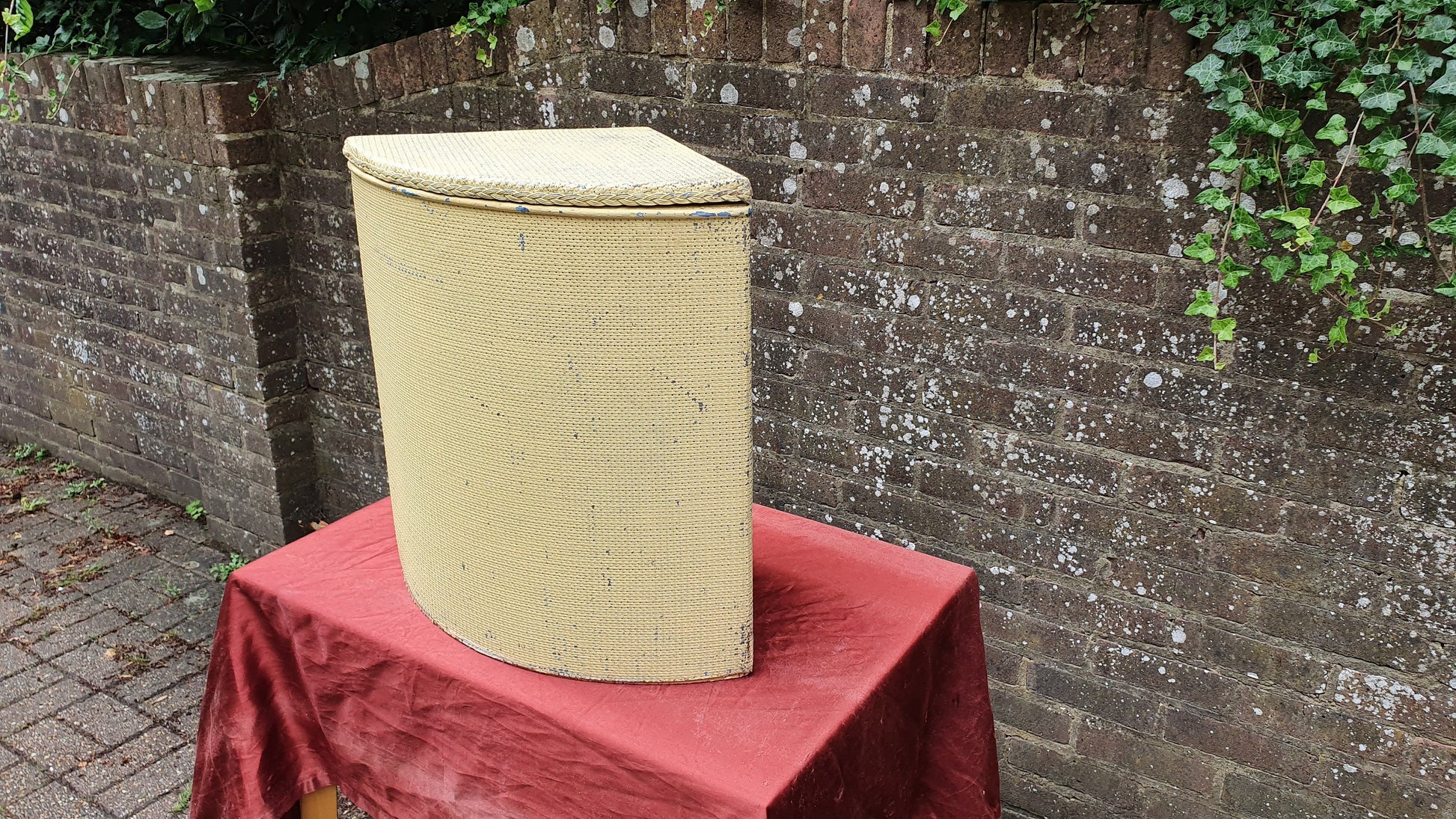 Painted Lloyd Loom Style Yellow Painted Corner Linen Basket.