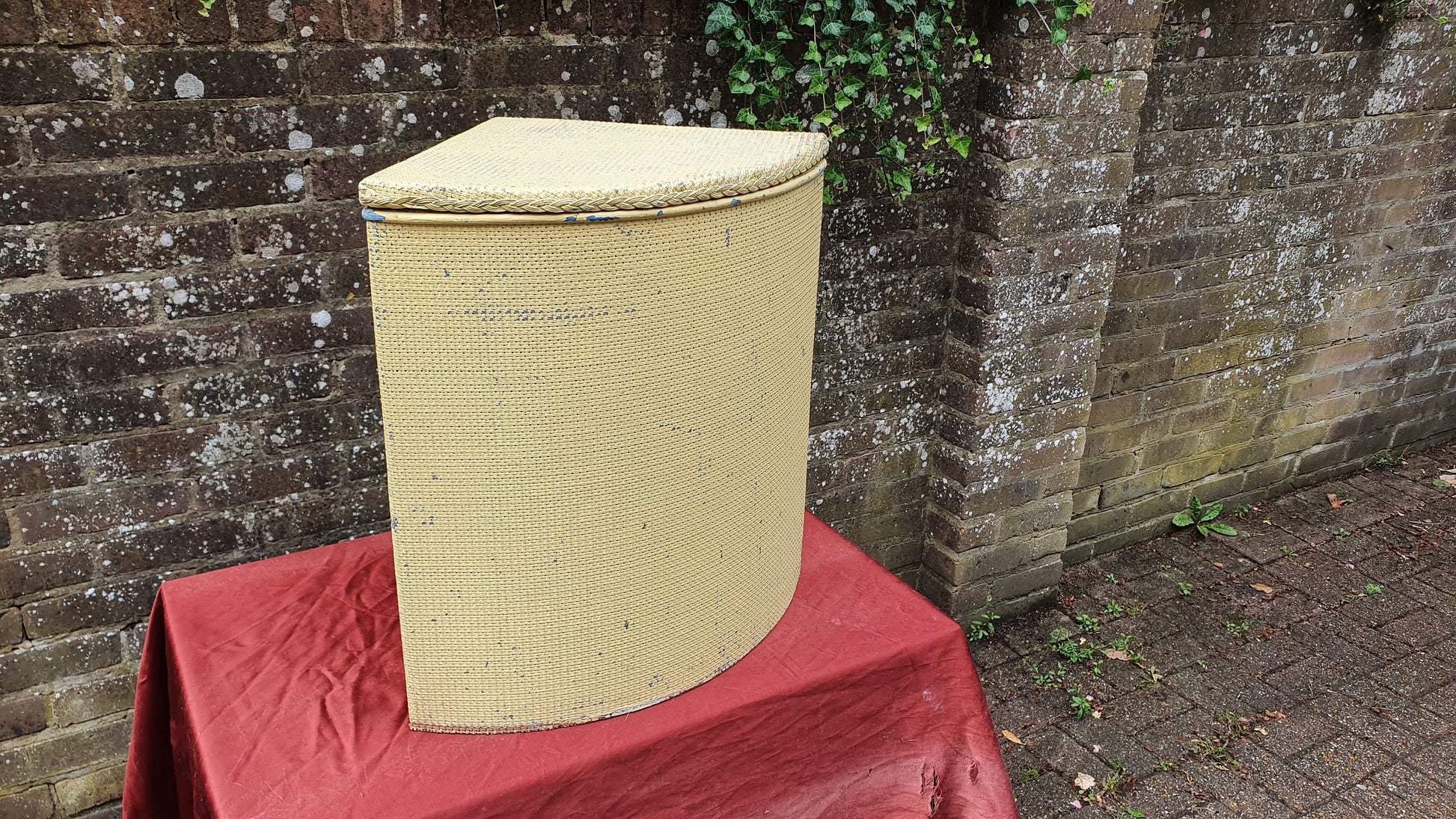 Painted Lloyd Loom Style Yellow Painted Corner Linen Basket.