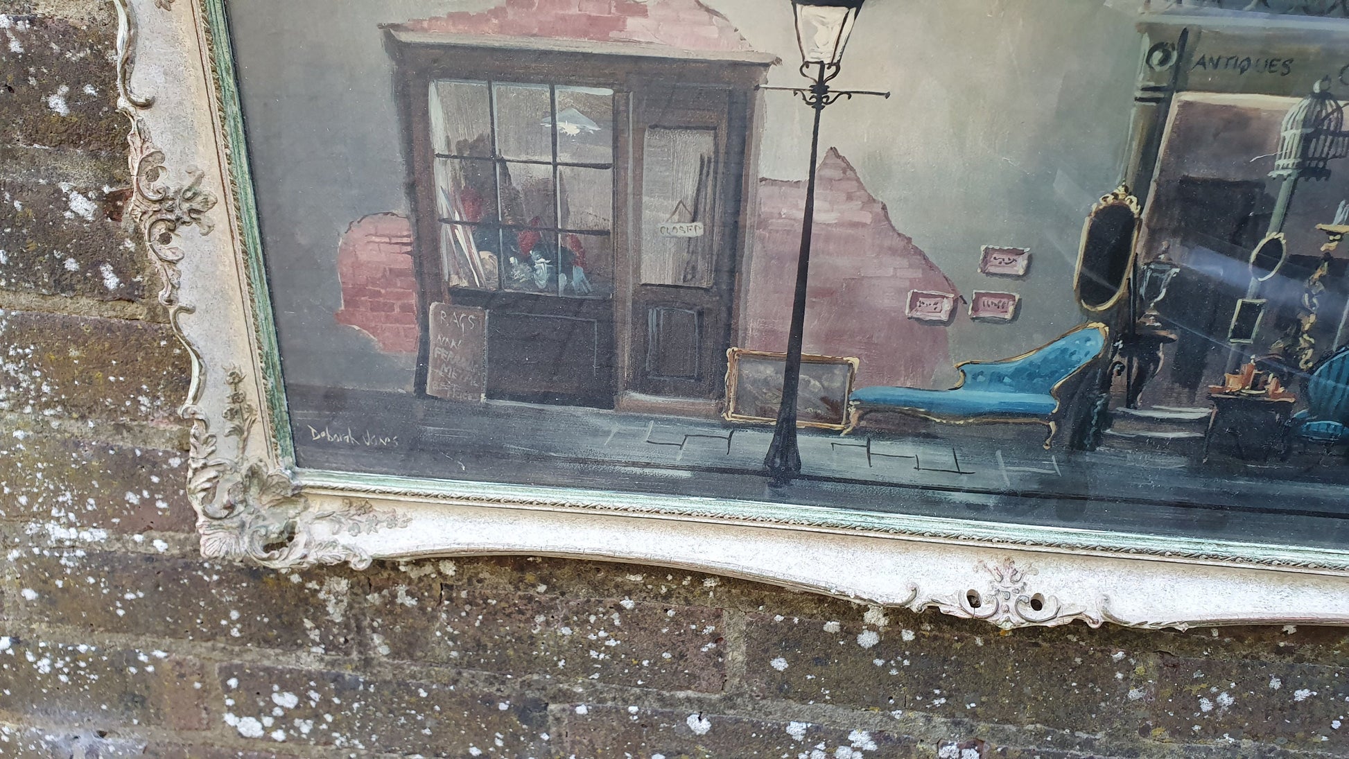 Wonderful Vintage ‘Antique Shop. Print in Swept Painted Frame.by Deborah Jones 85 x 40 cm
