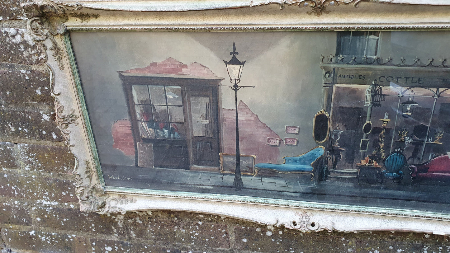 Wonderful Vintage ‘Antique Shop. Print in Swept Painted Frame.by Deborah Jones 85 x 40 cm