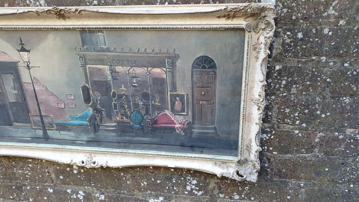 Wonderful Vintage ‘Antique Shop. Print in Swept Painted Frame.by Deborah Jones 85 x 40 cm