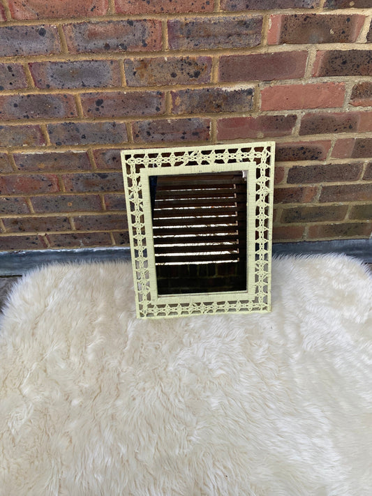 cream rattan mirror; used, ready tohang