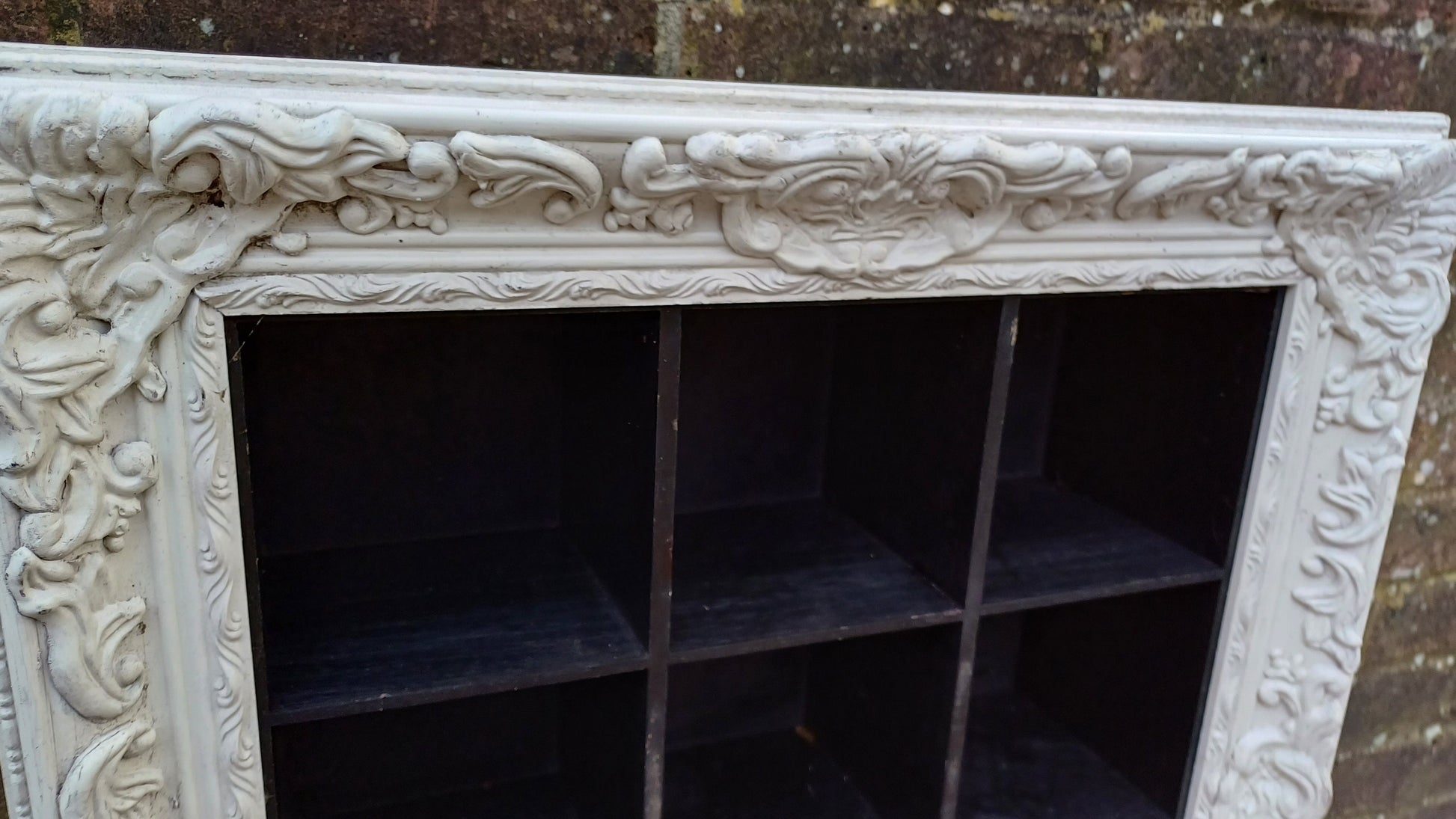 Vintage Style Wooden Black and White Cubby Hole Shelves Within Orante White Frame.