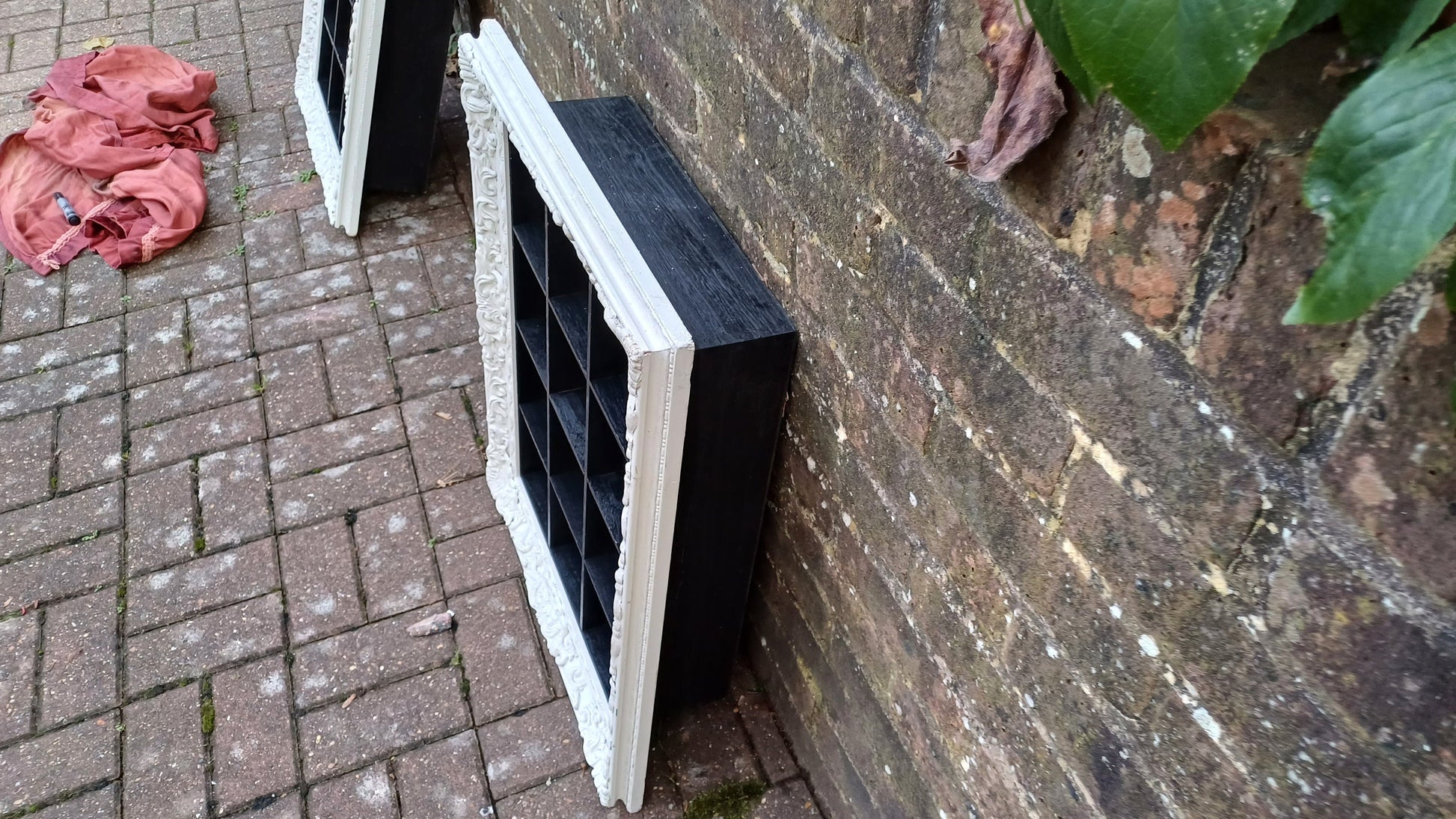 Vintage Style Wooden Black and White Cubby Hole Shelves Within Orante White Frame.