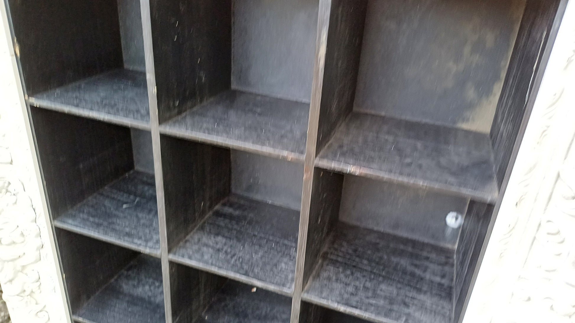 Vintage Style Wooden Black and White Cubby Hole Shelves Within Orante White Frame.