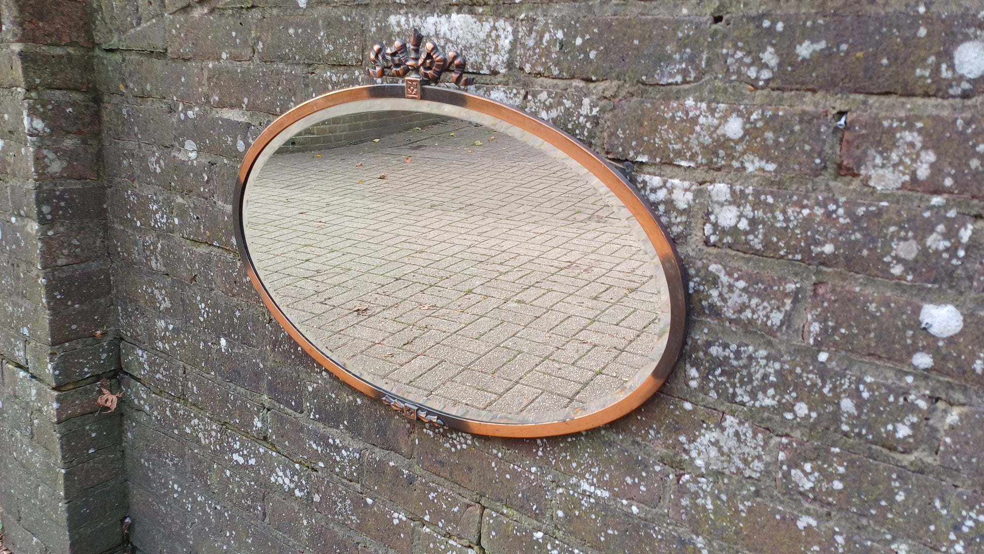 Vintage Metal Copper Oval Mirror Ribbon Decoration Early 20th Century.