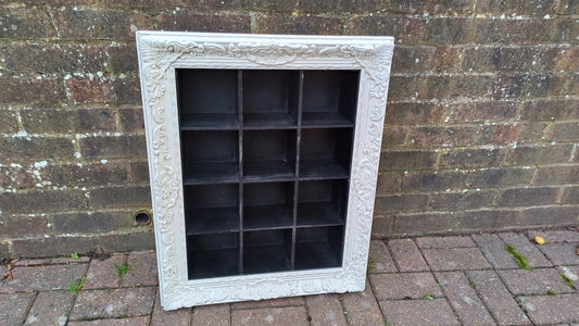 Vintage Style Wooden Black and White Cubby Hole Shelves Within Orante White Frame.
