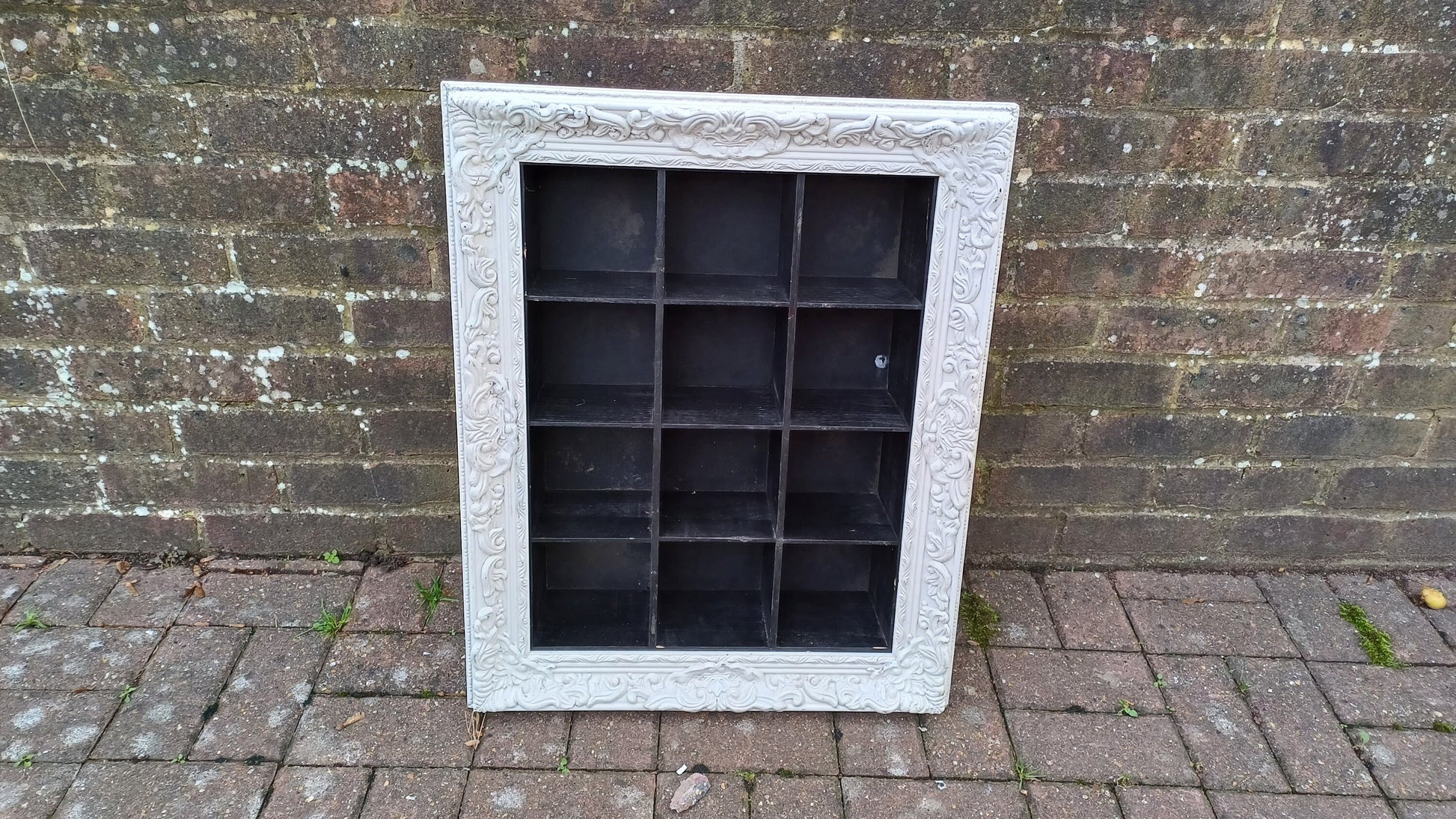 Vintage Style Wooden Black and White Cubby Hole Shelves Within Orante White Frame.