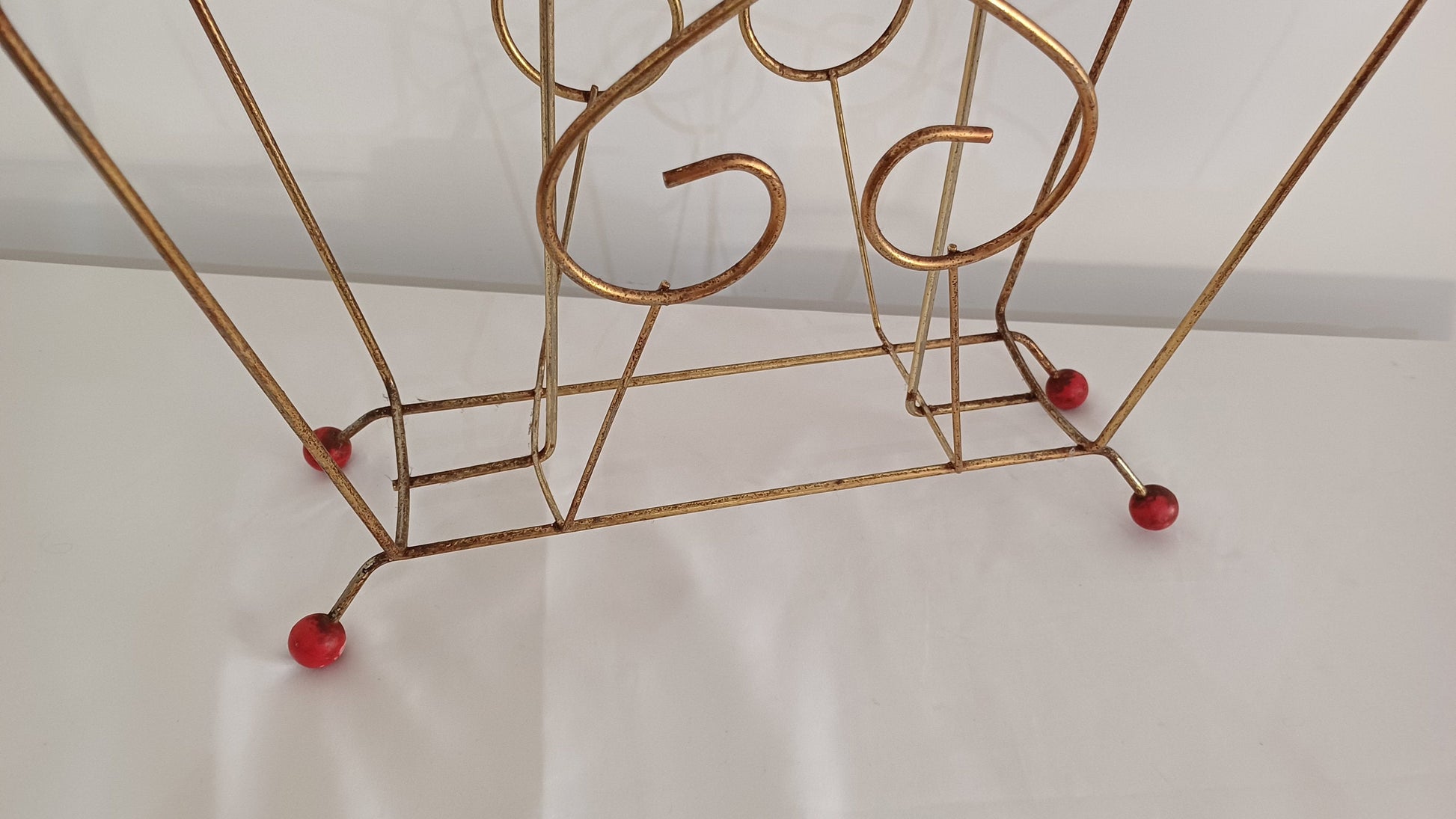 Cute Retro 1950s Gold Metal Magazine Rack With Atomic Feet.