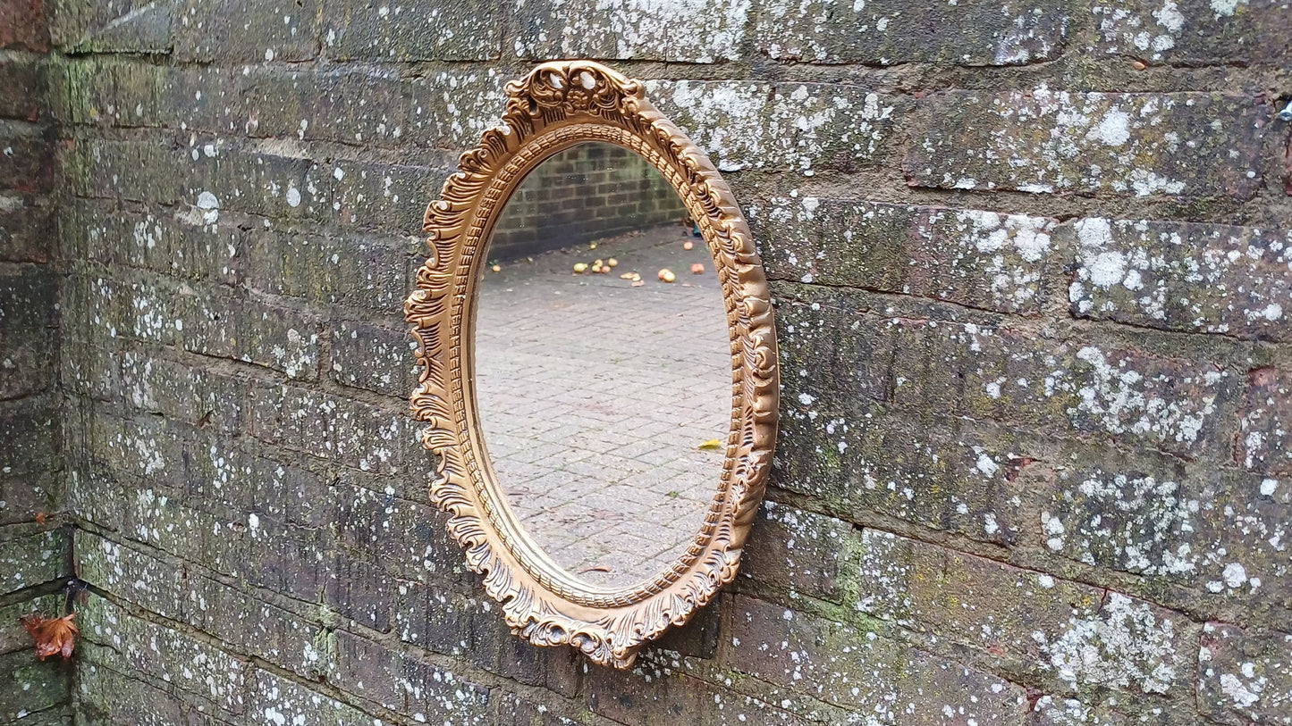 Vintage 60’s Ornate Oval Gold Gilt Decorative Mirror.