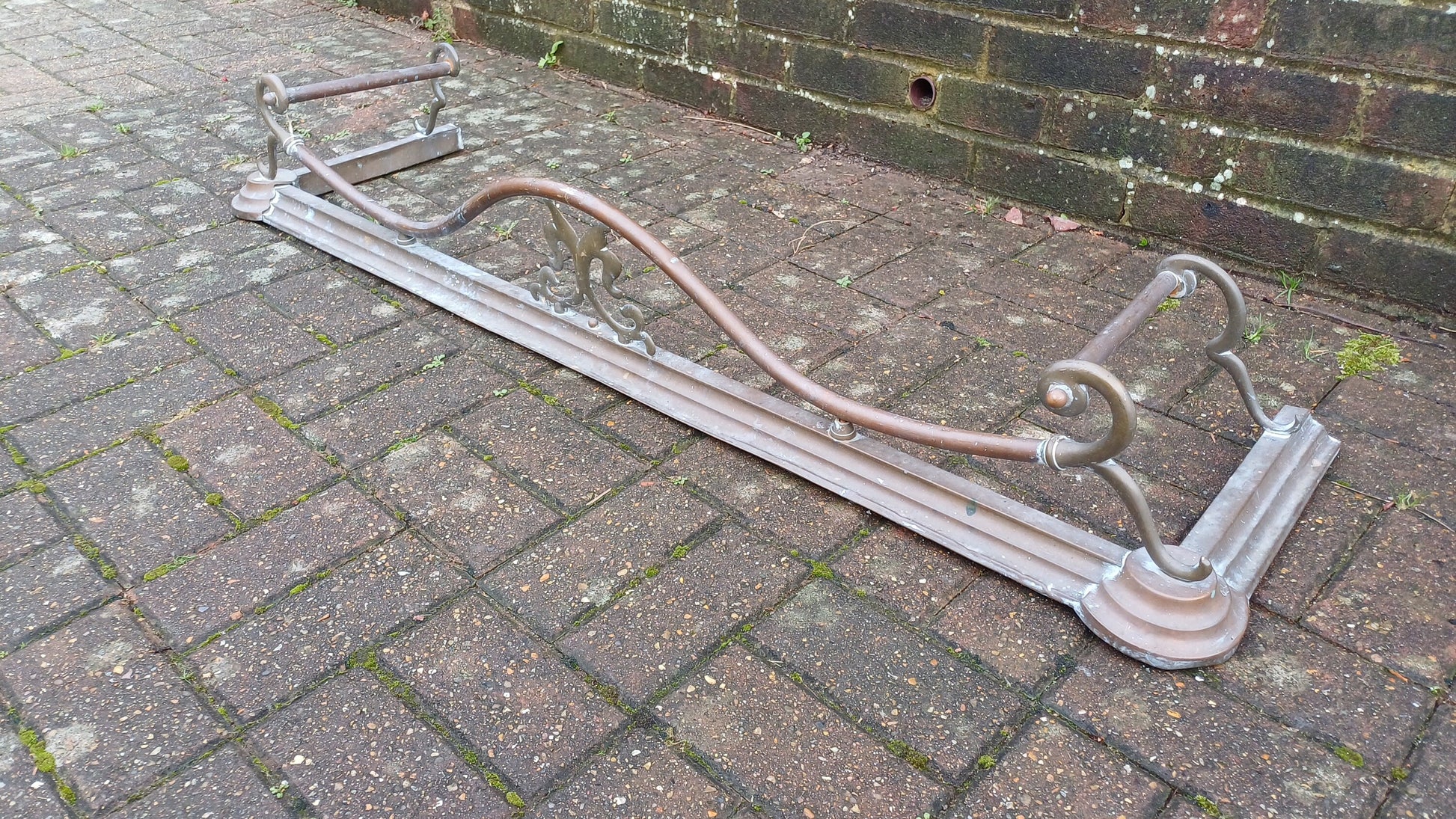 Vintage Brass Victorian Fender.