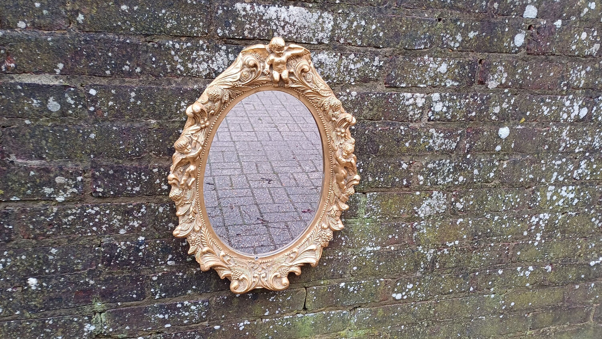 Vintage Composite Cherub Gold Gilt Decorative Mirror.