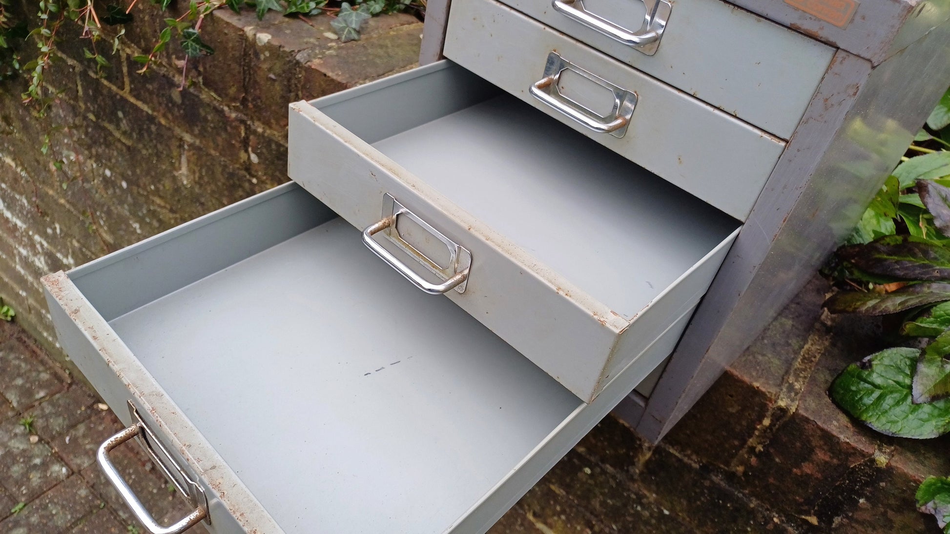 Retro Vintage Flight of Metal Drawers Storage Tools Artisan Desk Surface.