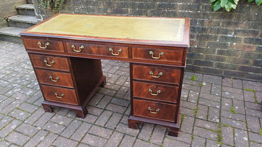 Vintage Mahogany Kneehole Pedestal Desk. Nine Drawers. Splits.