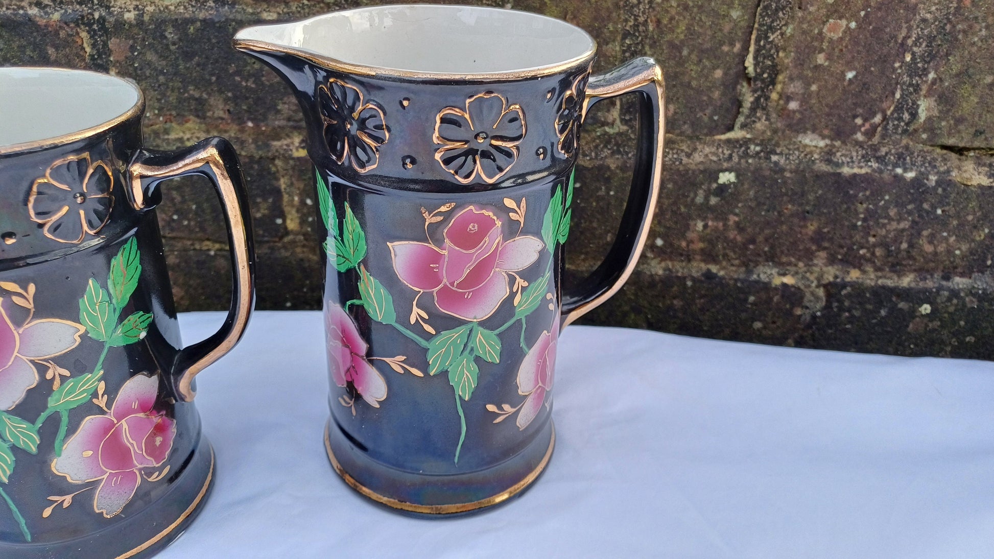 Rare Set of Vintage Victorian Graduated Jugs Black with Pink Flowers Gold Decoration.