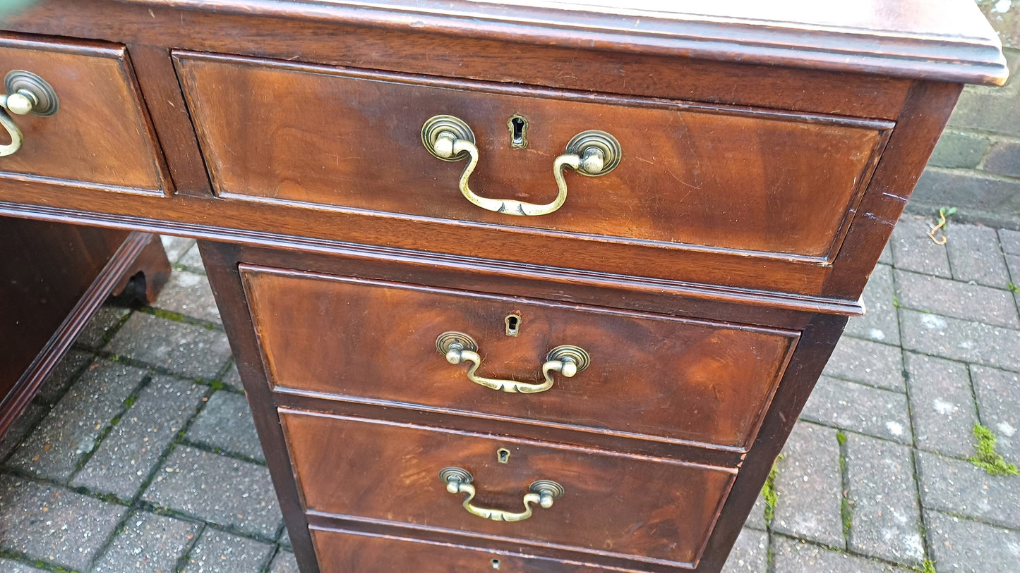 Vintage Mahogany Kneehole Pedestal Desk. Nine Drawers. Splits.