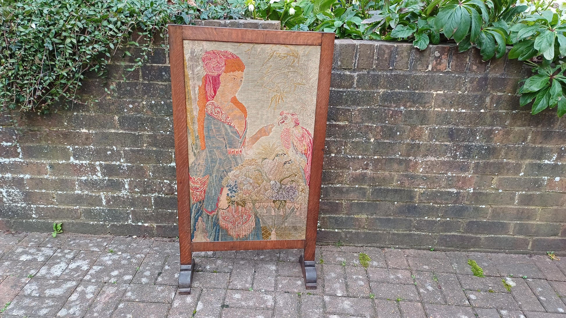 Large Vintage Solid Oak Arts and Crafts Fire Screen Tapestry Lady Feeding Parrot. One Metre Tall