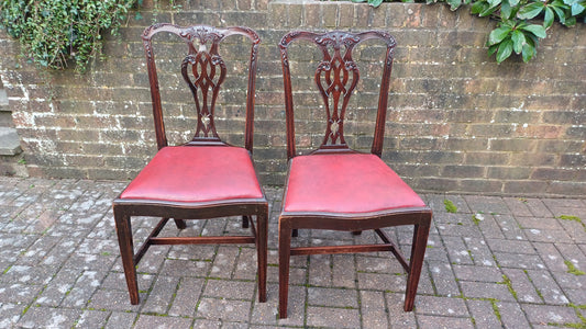 Pair of Vintage Late Victorian Carved Mahogany Chairs Red Leatherette Seats.