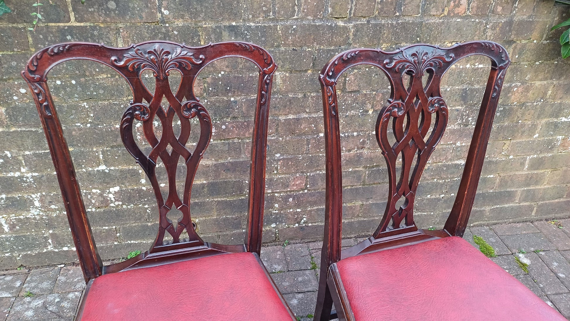 Pair of Vintage Late Victorian Carved Mahogany Chairs Red Leatherette Seats.
