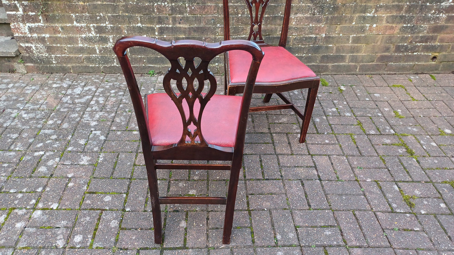 Pair of Vintage Late Victorian Carved Mahogany Chairs Red Leatherette Seats.