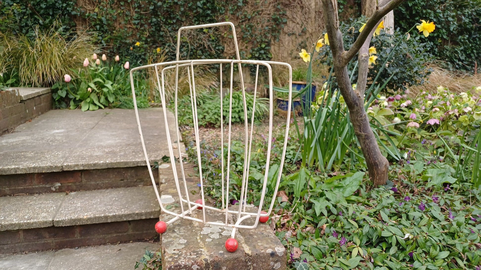 Vintage Retro White Metal Magazine Rack with Atomic Red Feet.
