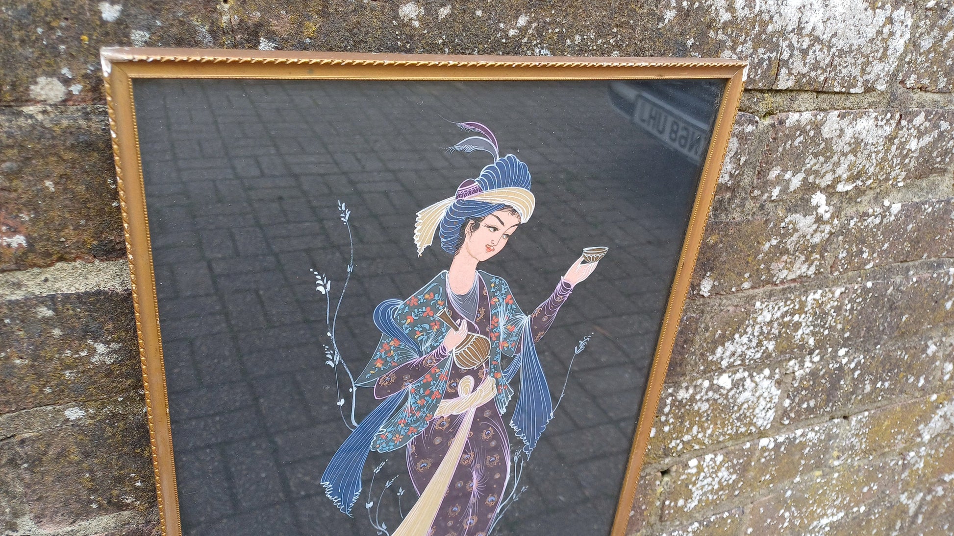 Two interesting Arabian prince princess paintings - colourful on black brown background, vintage gold glazed frames; Arabic Arabian Nights