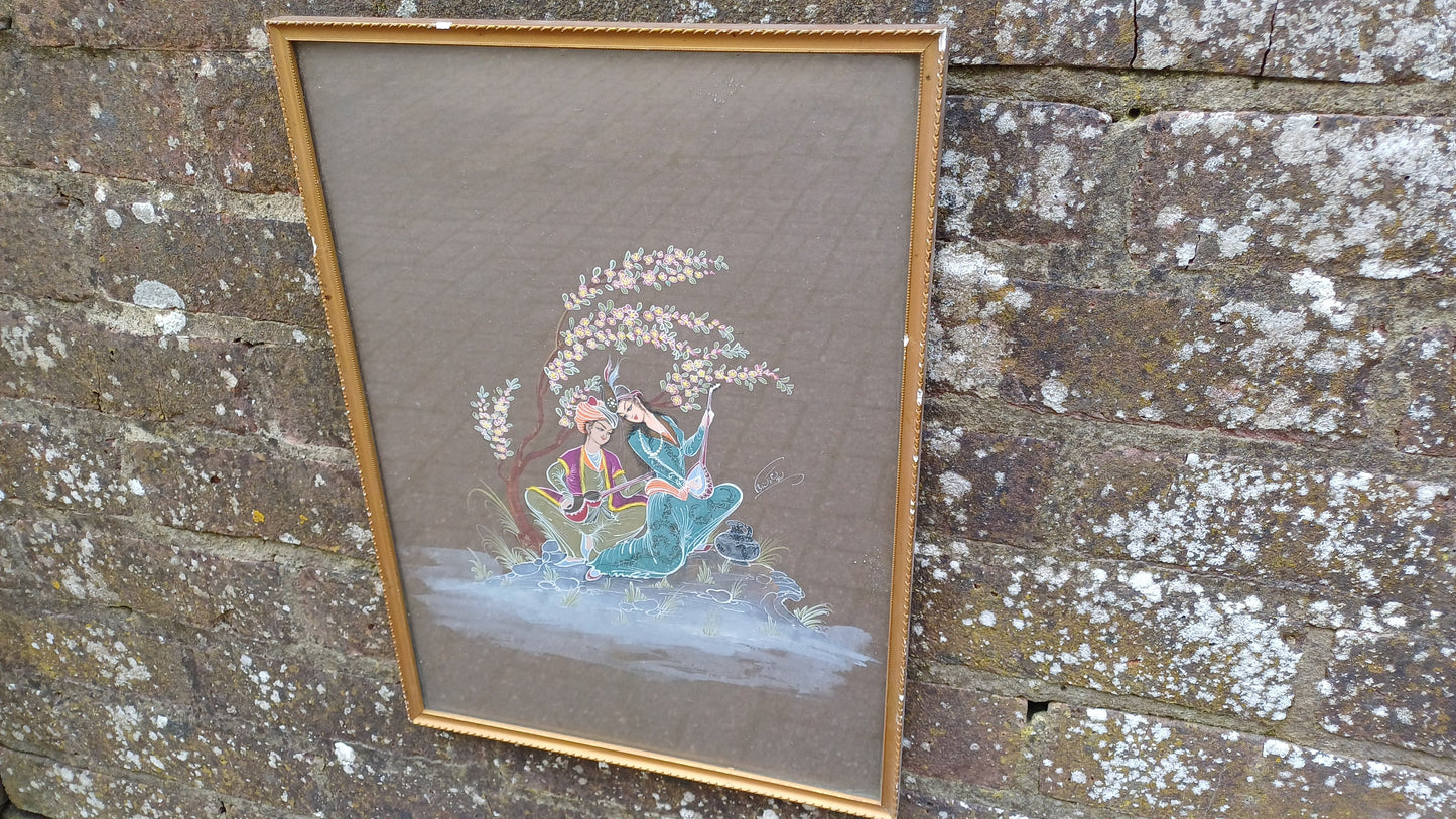 Two interesting Arabian prince princess paintings - colourful on black brown background, vintage gold glazed frames; Arabic Arabian Nights