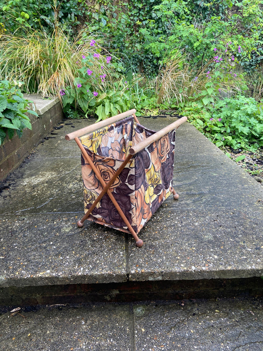 boldorange and brown roses on a knitting basket
