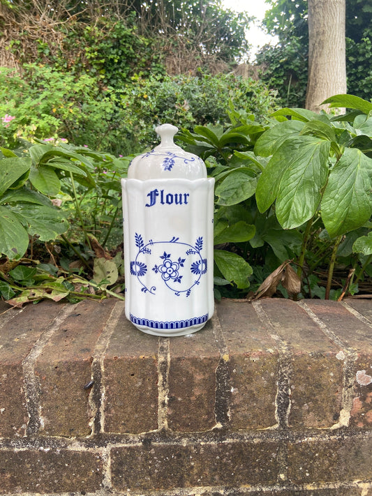 blue and white storage jar. Made by TC and style is Blue Onion. Labelled as a flour storage jar but multi purpose. very good condition