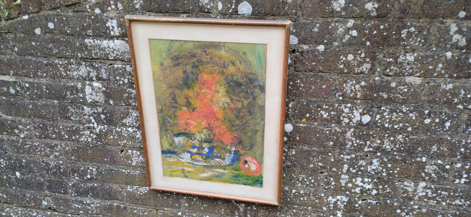 an abstract oil painting of a still life flower scene; very attractive in bold oranges, yellows blues, reds, greens. mounted in an off white card mount and the frames in a vintage shabby chic gold and wood frame