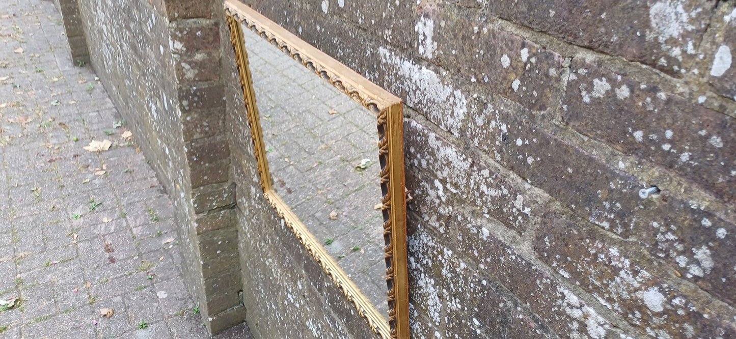 Large Vintage 60s Gold and Black Ornate Wall Mirror.