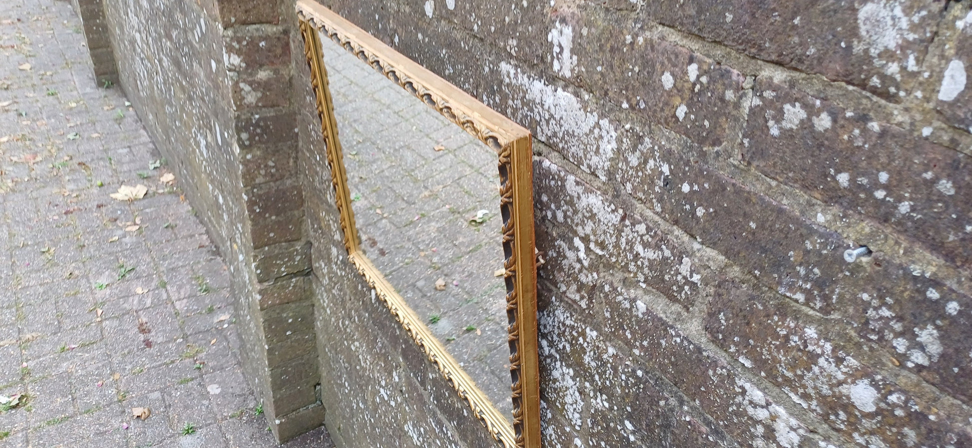 Large Vintage 60s Gold and Black Ornate Wall Mirror.