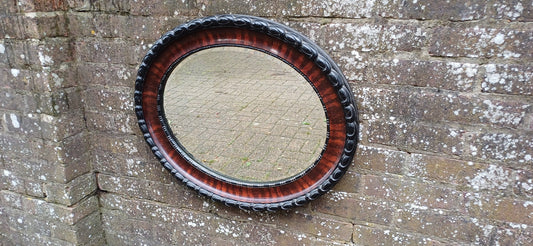 Vintage Early 20th Century Chunky Oval Decorative Mirror Black and Maroon Hues