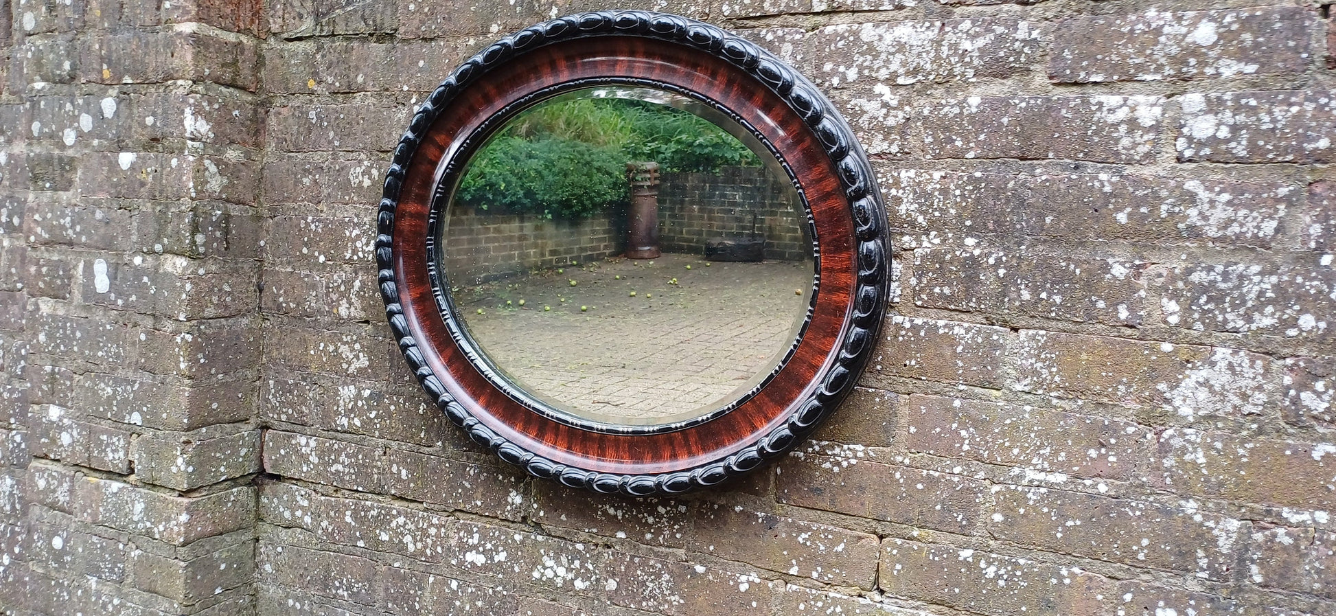 Vintage Early 20th Century Chunky Oval Decorative Mirror Black and Maroon Hues