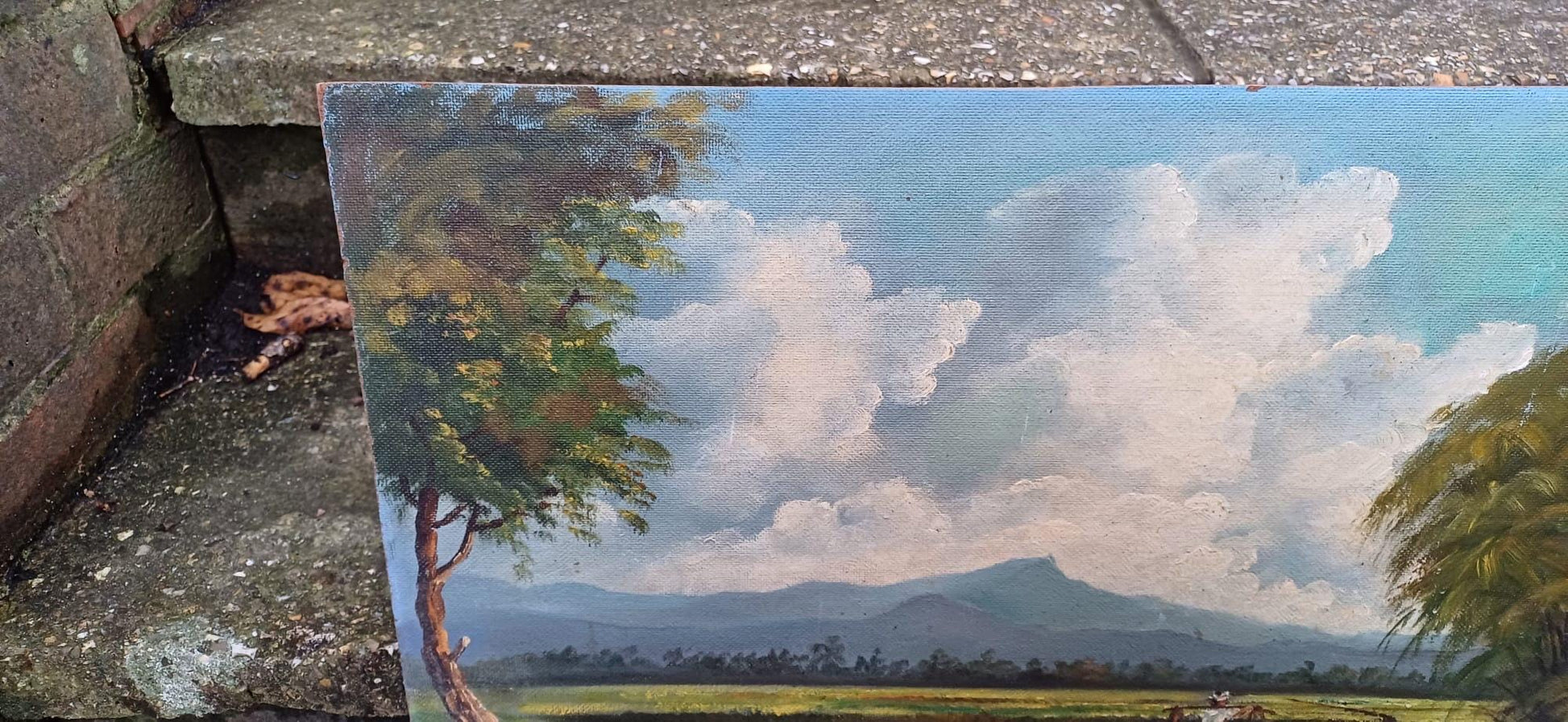 1960s oil on board by artist Yusoff Abdullah. Rural scene of a villager / farmer carrying goods across a field. Signed painting