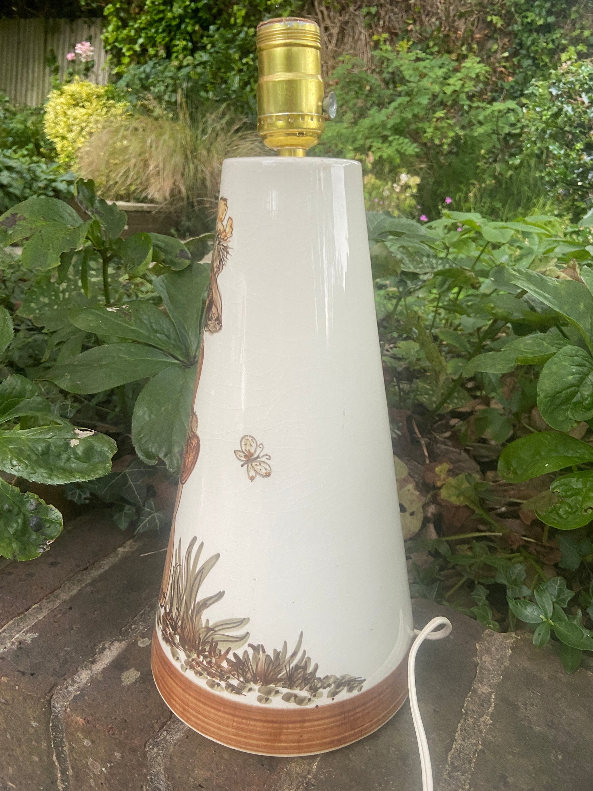 1970s retro Jersey Pottery large table lamp of a wide eyed boy character - delightful working condition